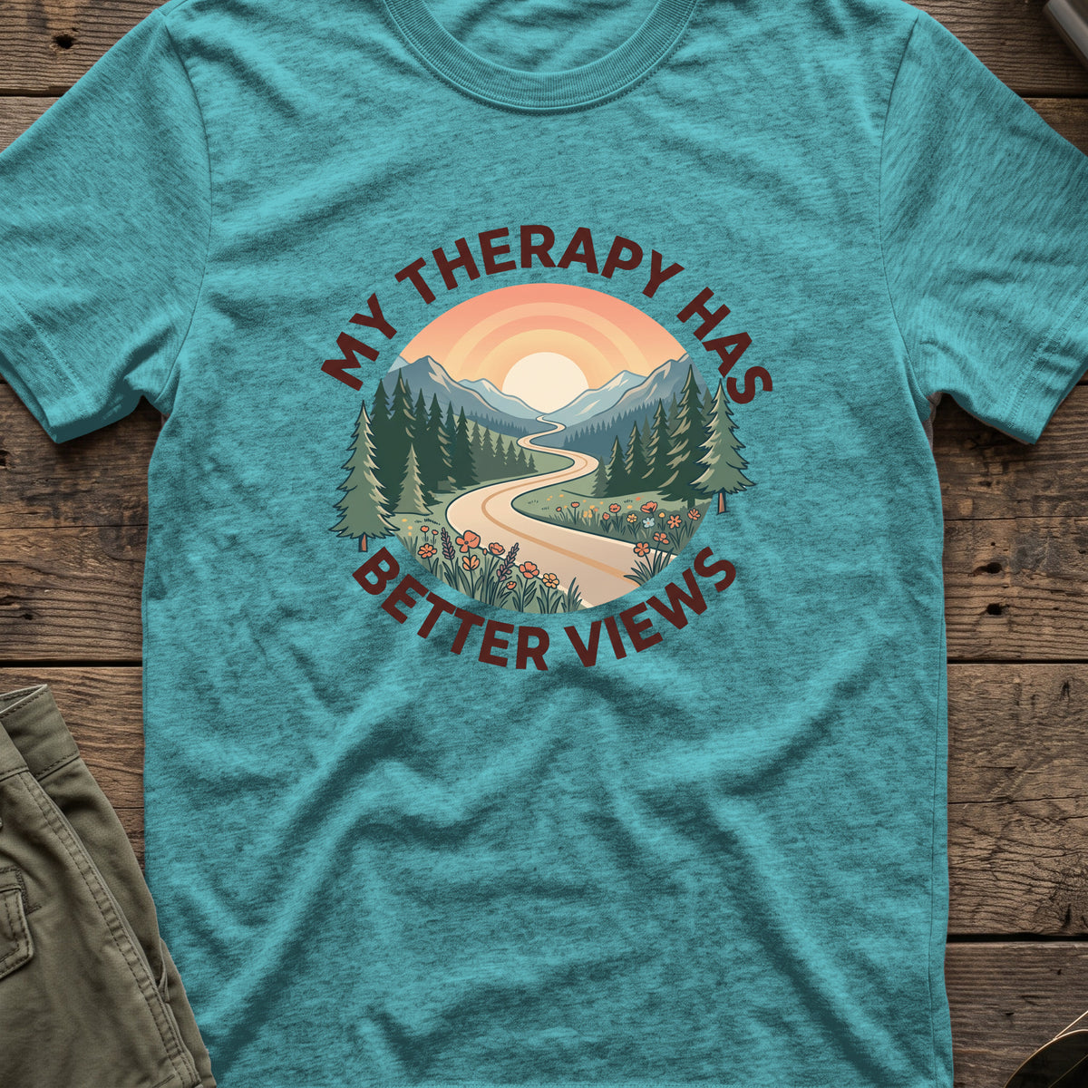 My Therapy has Better Views T-Shirt in Heather Galapagos Blue, front view.