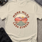 More Miles and Less Stress T-Shirt in Sand, front view.