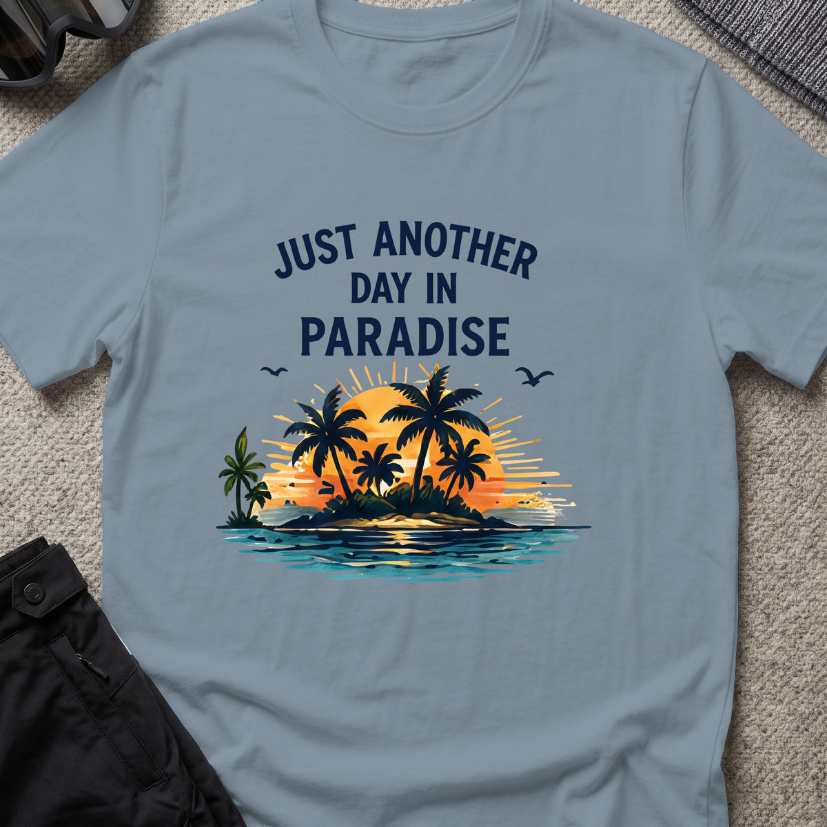 Just Another Day in Paradise T-Shirt in Stone Blue, front view.