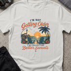 Chasing Better Sunsets T-Shirt in Ice Grey, front view.