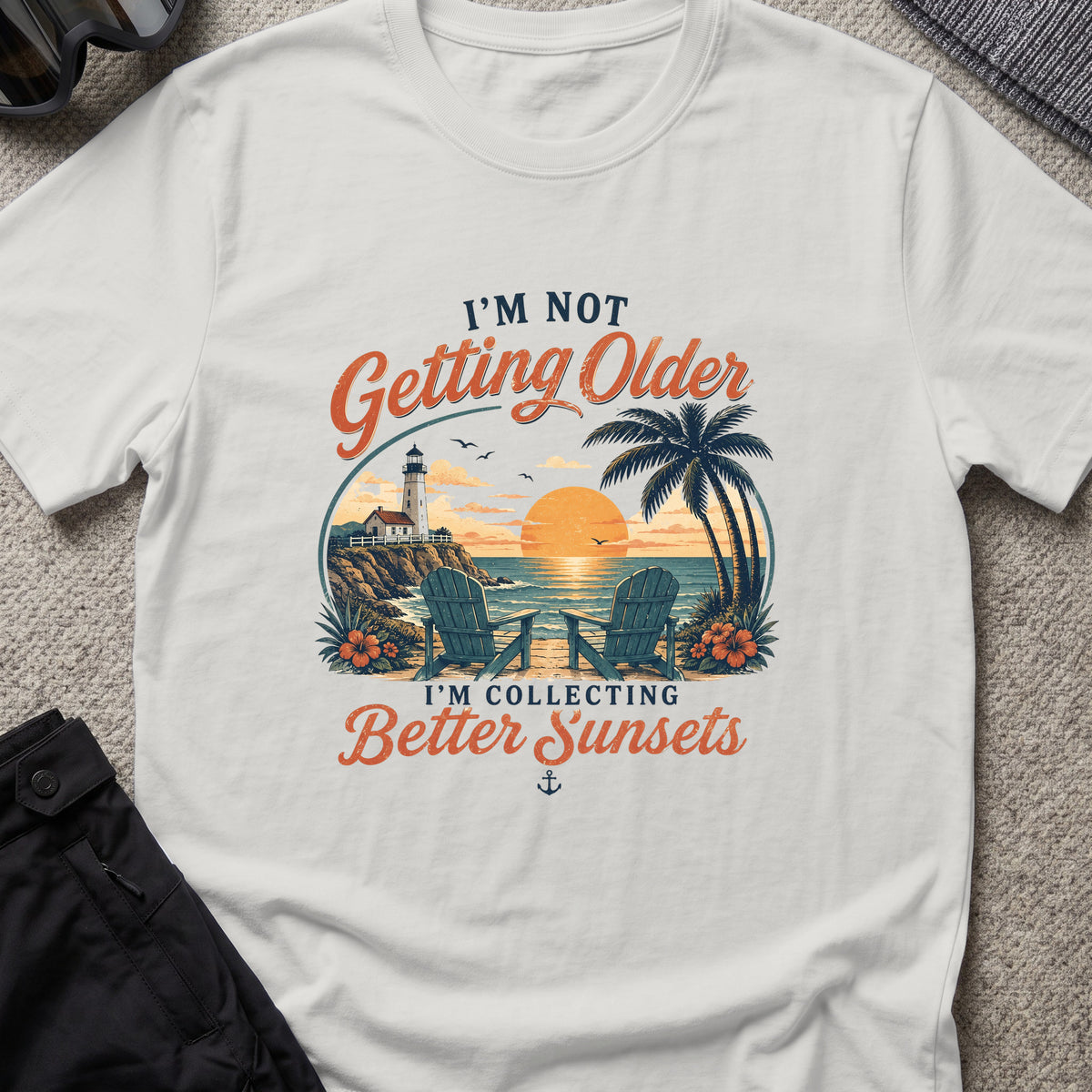 Chasing Better Sunsets T-Shirt in Ice Grey, front view.