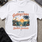 Chasing Better Sunsets T-Shirt in White, front view.