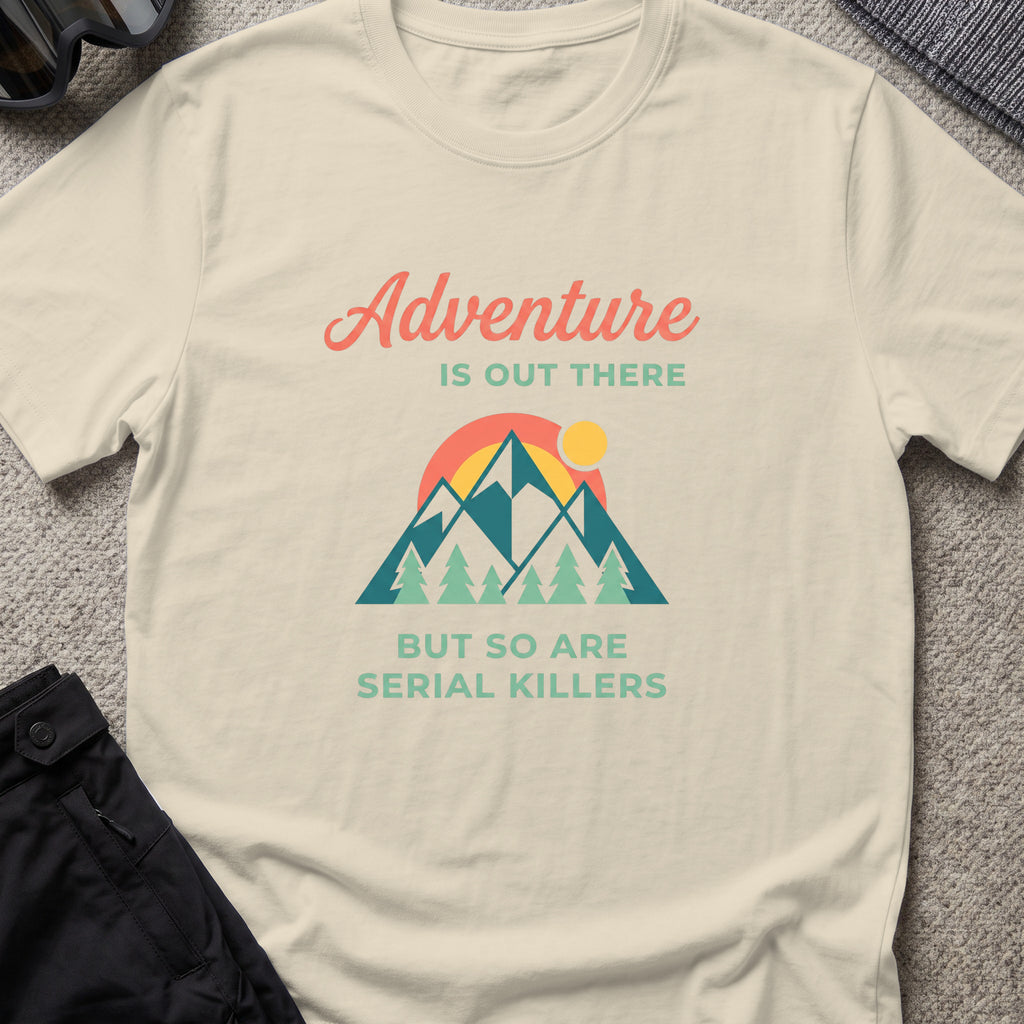 Adventure Is Out There (But So Are Serial Killers) T-Shirt in Sand, front view.
