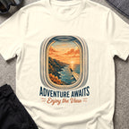 Adventure Awaits T-Shirt — Window Seat in Natural, front view.
