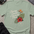 Chasing Uncharted Sunsets T-Shirt in Sage, front view.