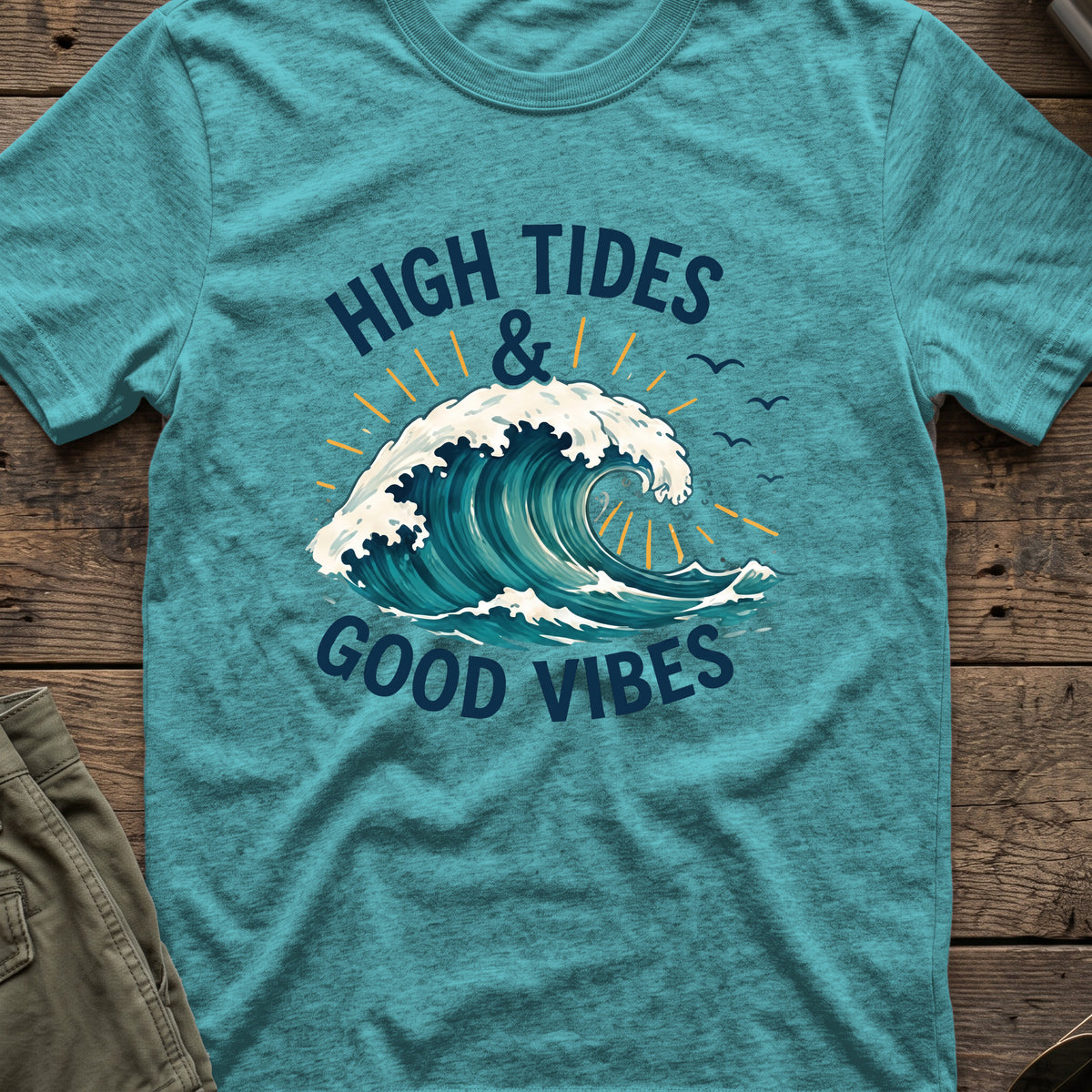 High Tides and Good Vibes T-Shirt in Heather Galapagos Blue, front view.