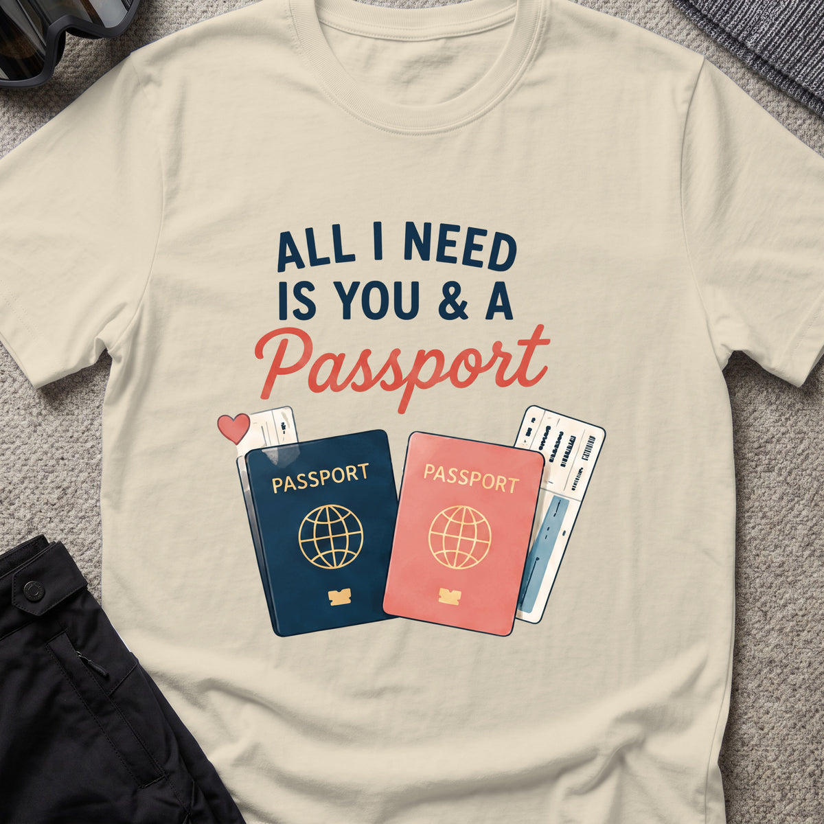 All I Need is You and a Passport T-Shirt in Sand, front view.