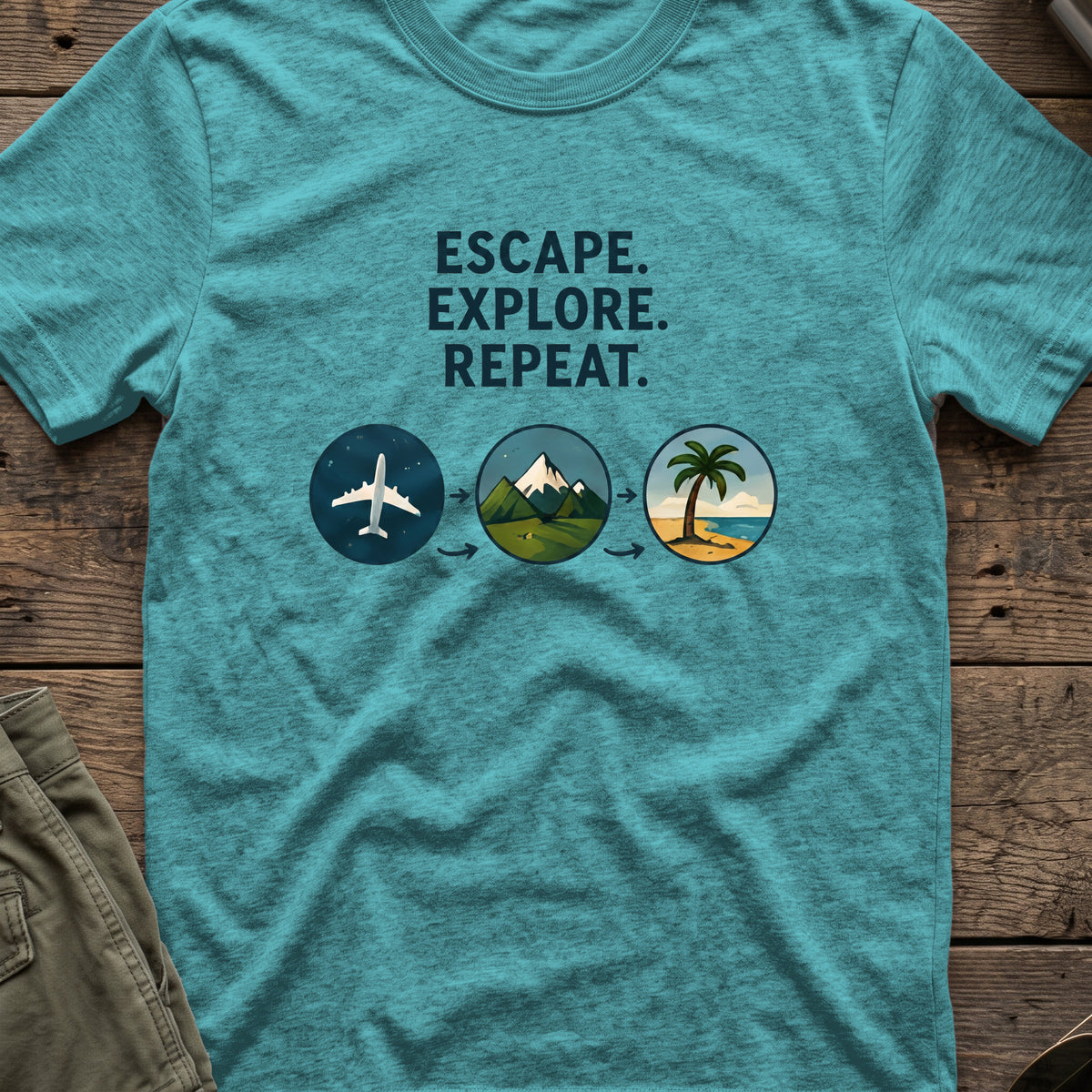 Escape Explore Repeat T-Shirt in Heather Galapagos Blue, front view.