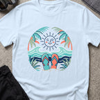Flip Flops in the Sand T-Shirt in Light Blue, front view.