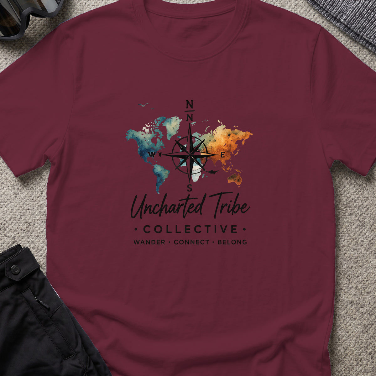 Uncharted World T-Shirt in Maroon, front view.