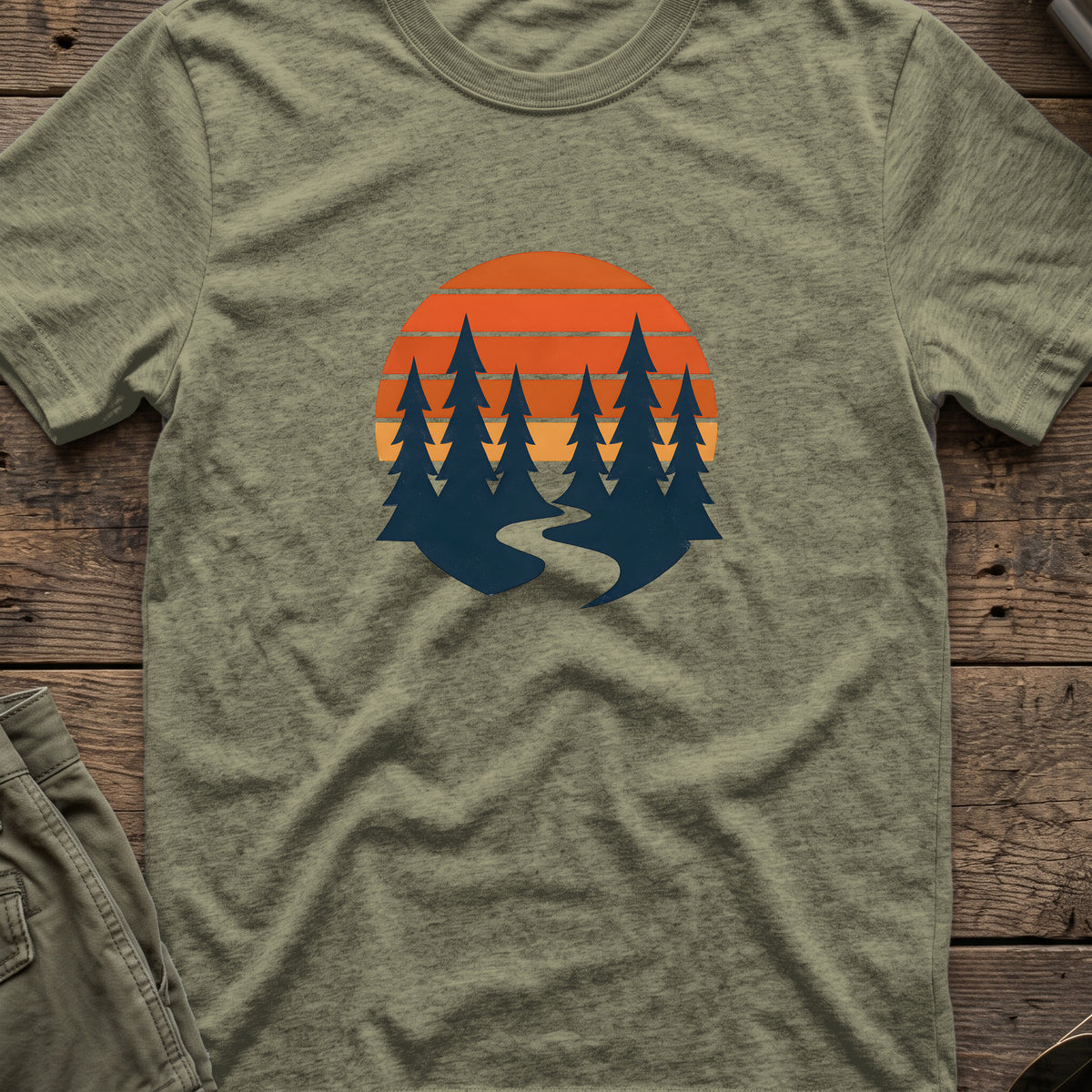 Sunset forest silhouettes T-Shirt in Heather Military Green, front view.