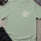 Born To Beach T-Shirt in Sage, front view.
