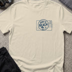 Born To Beach T-Shirt in Sand, front view.