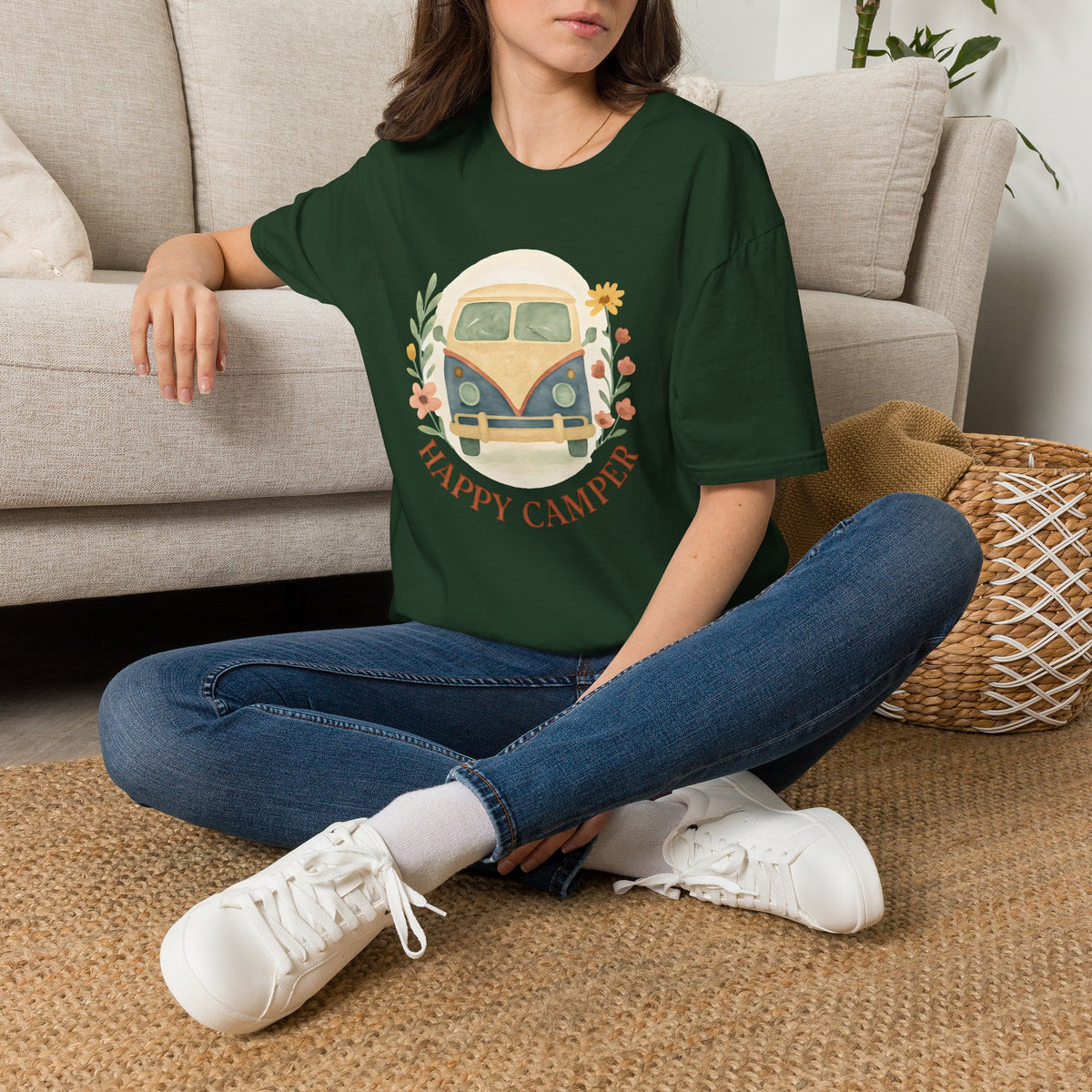Floral Camper Van 2 T-Shirt in Forest Green, front view on a seated model.
